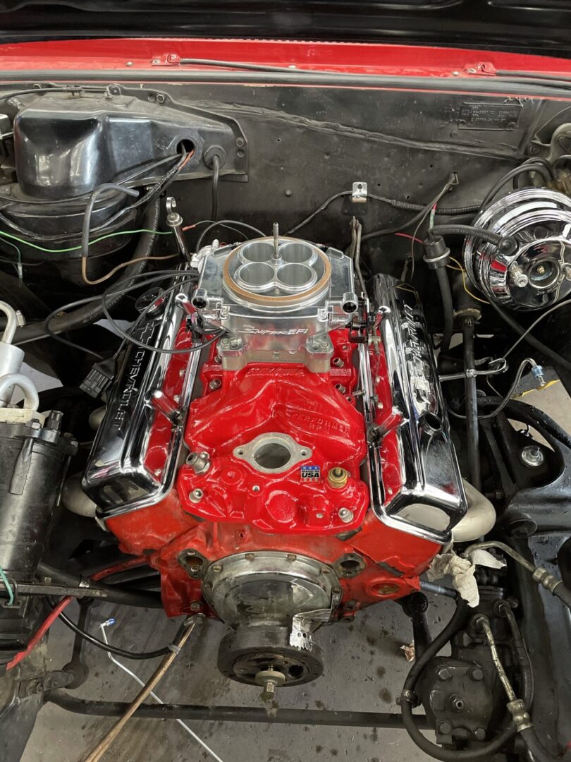 Red colour heavy car engine, auto parts
