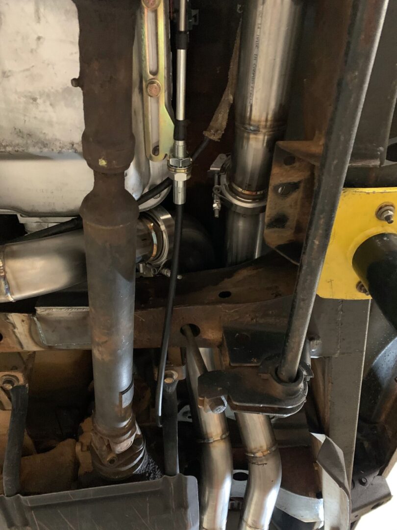 A rusty inside of a car exhaust at the shop