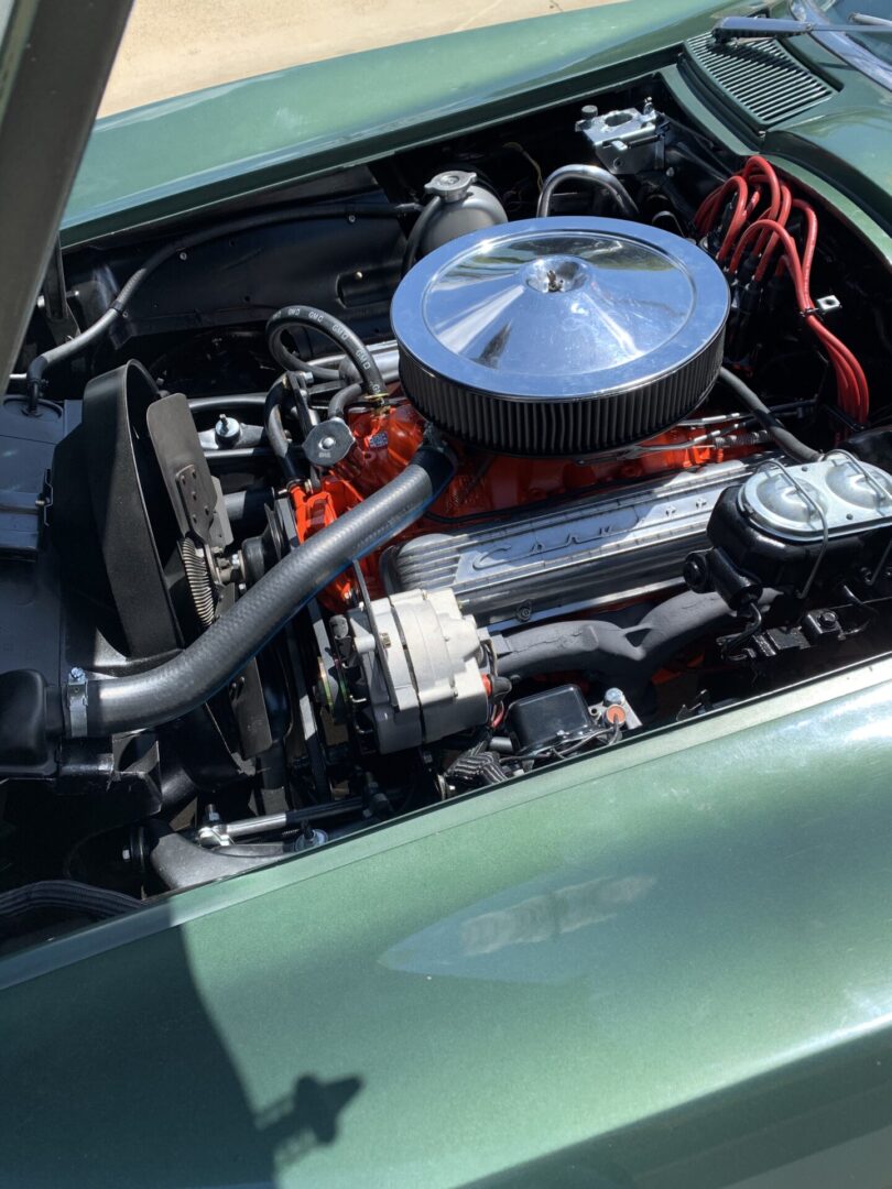 Side view of a green car engine