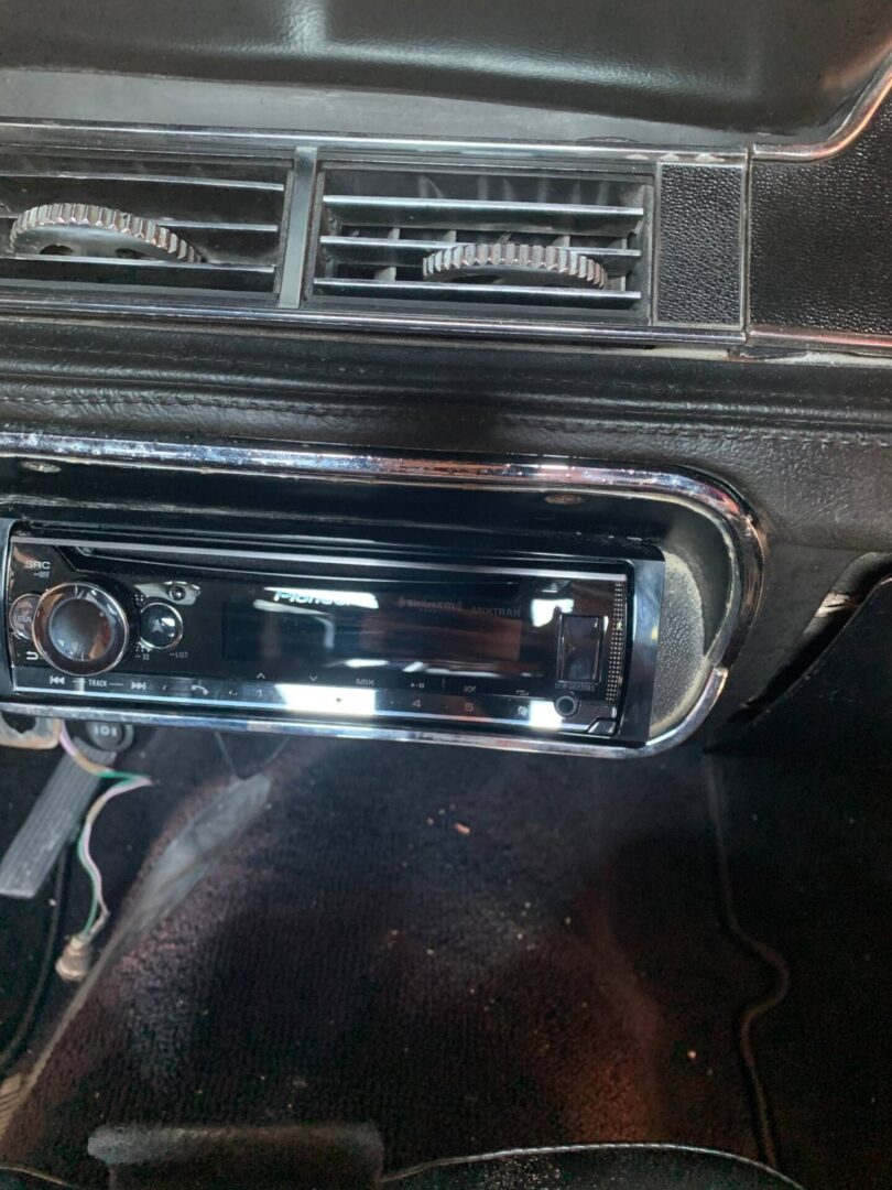 An inside view of a music player of a car
