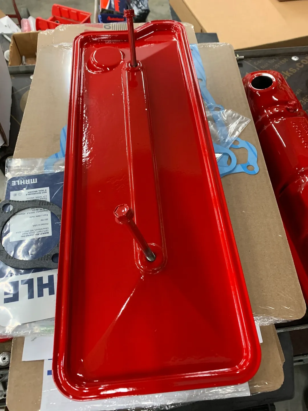 Cherry red, fabricated auto part