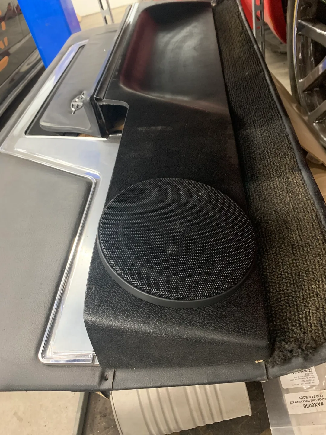 A stereo black cover for a car