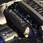 A black viper valve cover and coil cover