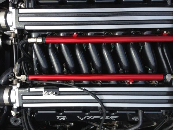 A black and red viper intake manifold part