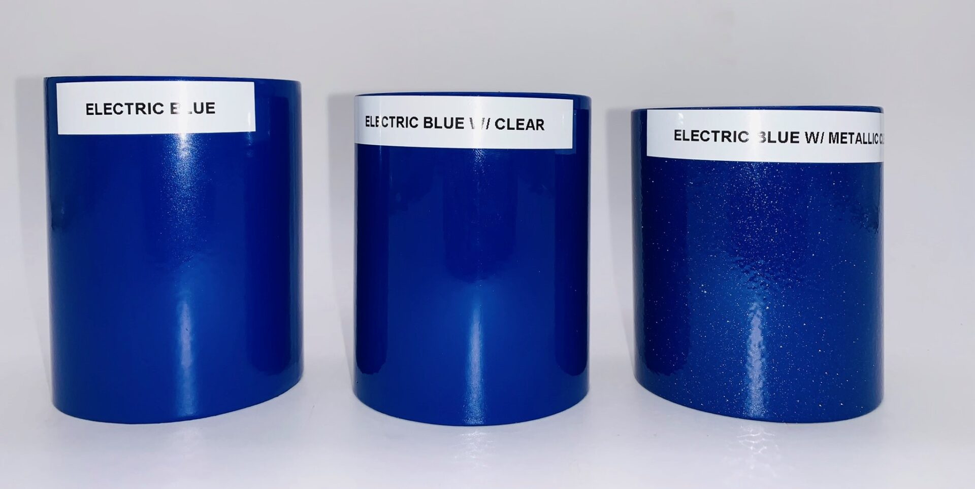 A set of three electric blue car parts